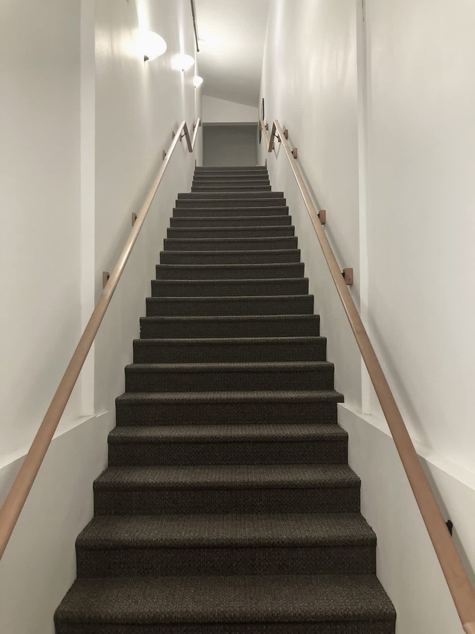 Front Street Suits Access Stairs to Units